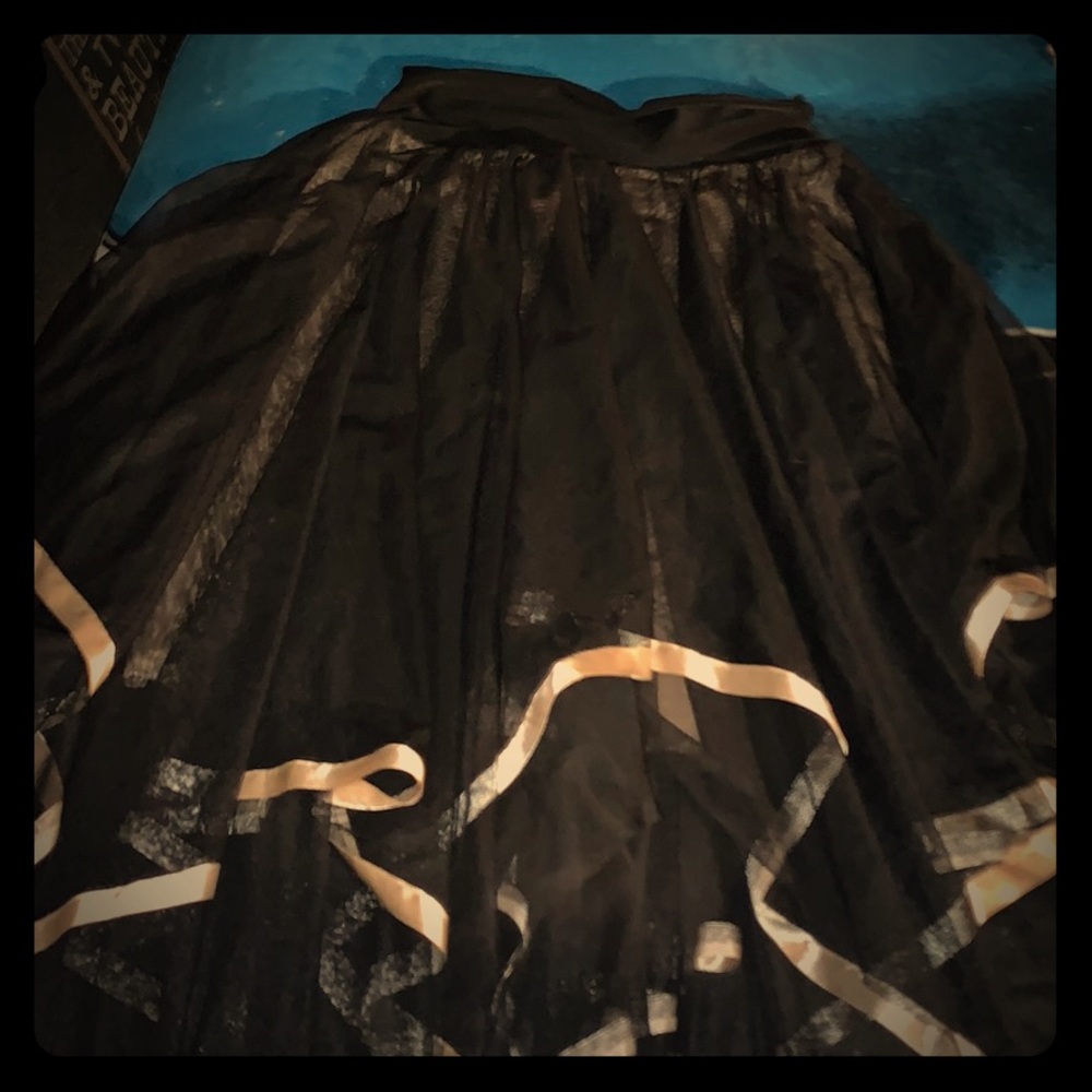 black skirt with gold trim